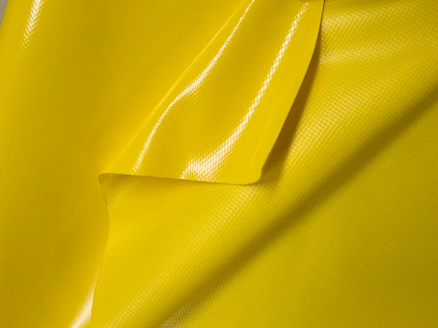 PVC Tensile Membrane Fabric Complete Guide: Material, GSM, Performance & Selection Tips